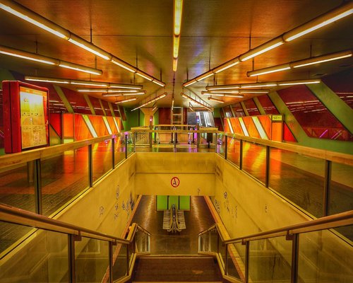 A person climbing subway stairs