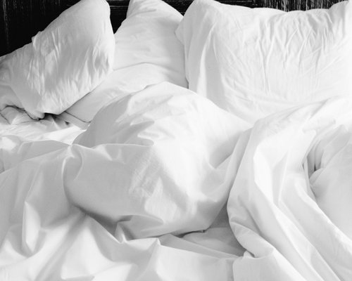 Soft pillows on a comfortable bed